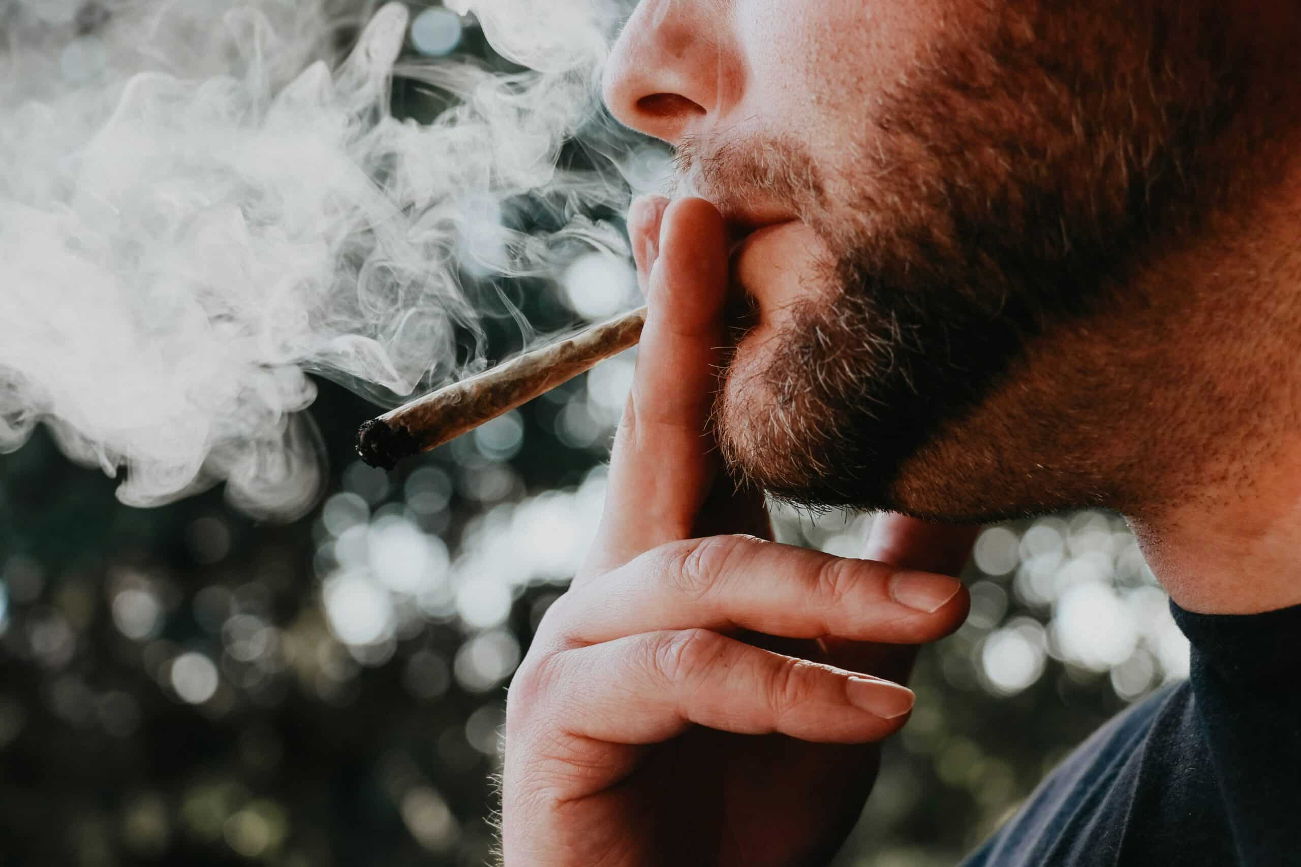 person smoking joint